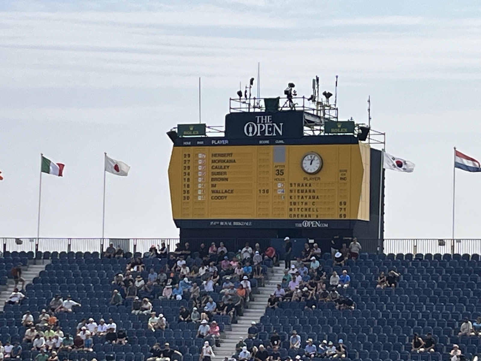 The traditional hand-operated yellow leaderboard at The Open Championship, Royal Birkdale